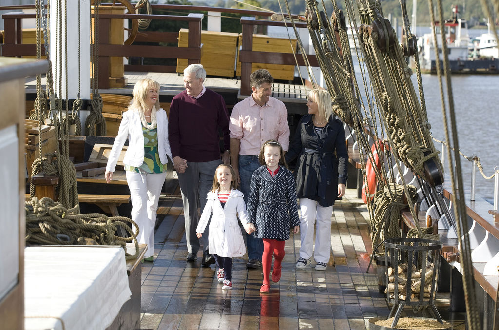 family on the deck of the ship